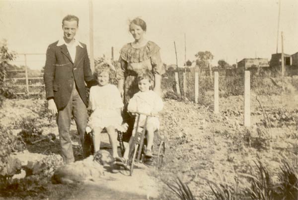Photograph of Hugh Samuel King, wife Alice and children, at 31 Manor Way, Southall