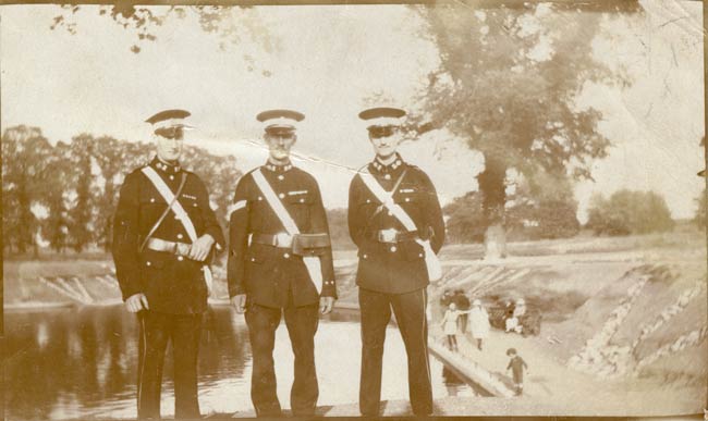 Photo of three uniformed members of St John Ambulance Brigade, Hugh Samuel King on right